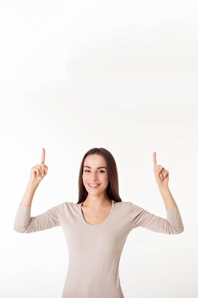 istock Young woman shows over herself and smiles. 682292056
