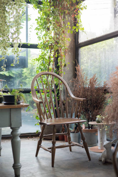 istock Brown wooden chair with flower 682293024
