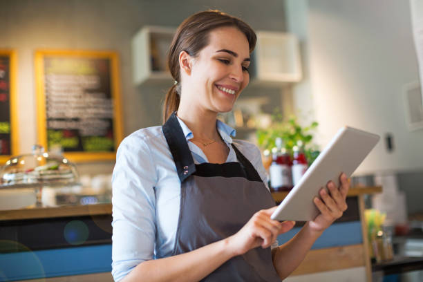 istock Woman working in coffee shop 682295864