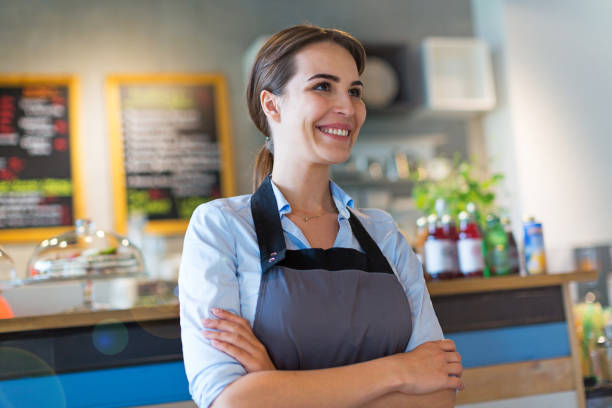 istock Woman working in coffee shop 682295950