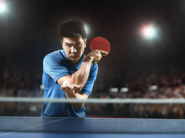 istock Young asian ping pong player playing table tennis game 682299618