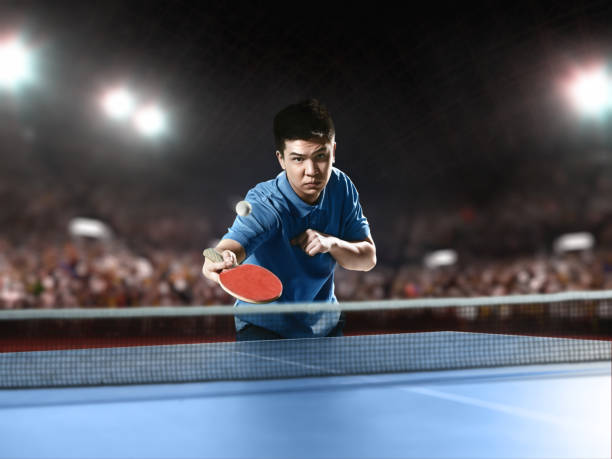 istock Young asian ping pong player playing table tennis game 682299630
