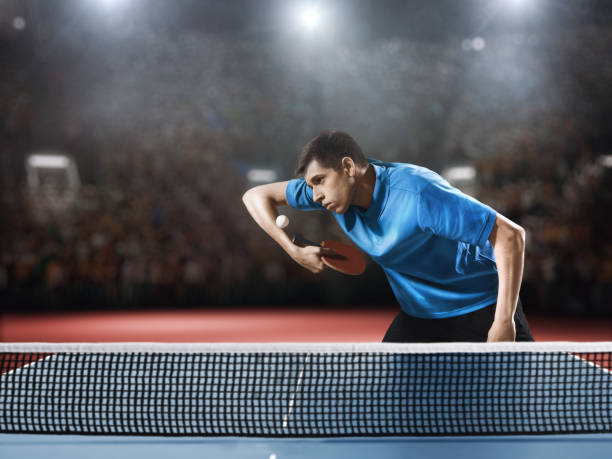 istock Young ping pong player playing table tennis game 682299634