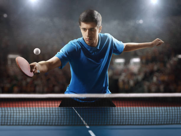 istock Young ping pong player playing table tennis game 682299694