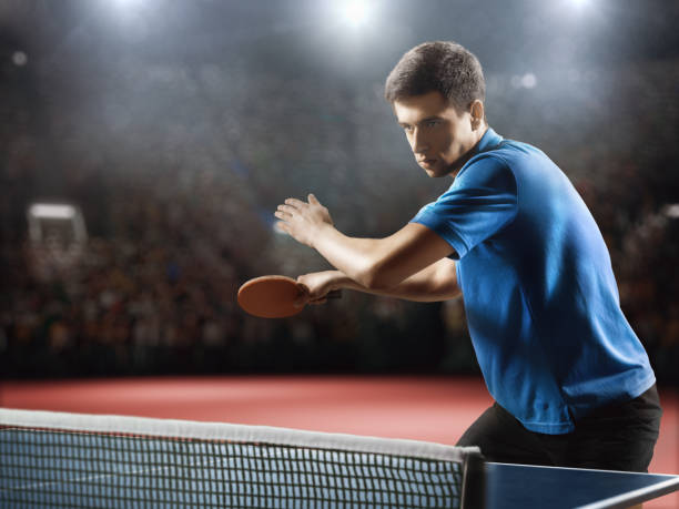 istock Young ping pong player playing table tennis game 682299698