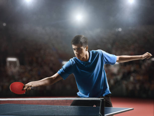 istock Young ping pong player playing table tennis game 682299706