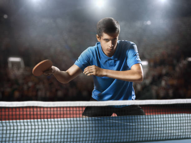 istock Young ping pong player playing table tennis game 682299730