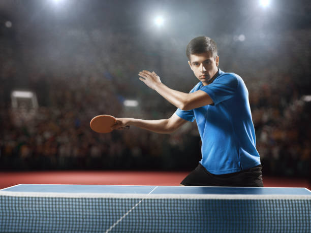istock Young ping pong player playing table tennis game 682299744