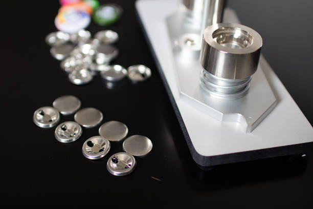 istock Pins press machine with empty pins and ready pins. Press button maker for 2,5 cm badge. 682308244