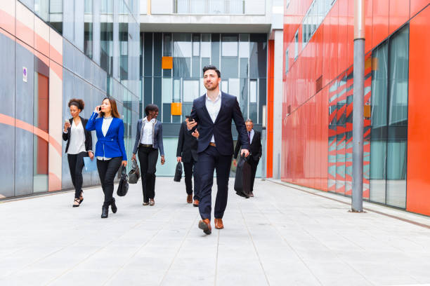 istock Business people walking on a street 682311590