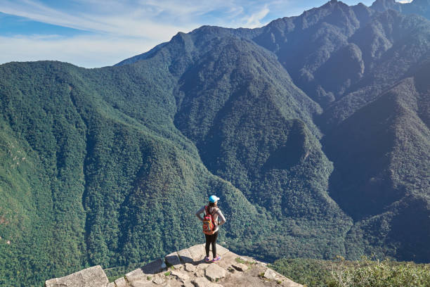 istock Woman on beautiful mountain landscape 682319192
