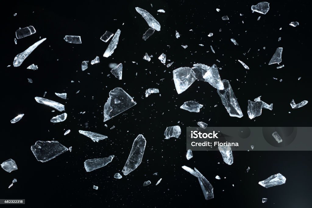 Broken crystals Sharp of broken crystal fragments on black background, studio shot, selective focus. Shattered Glass Stock Photo