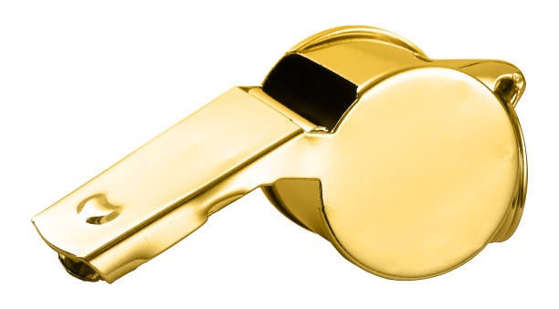 Golden whistle isolated against the white background Golden whistle isolated against the white background loudon stock pictures, royalty-free photos & images