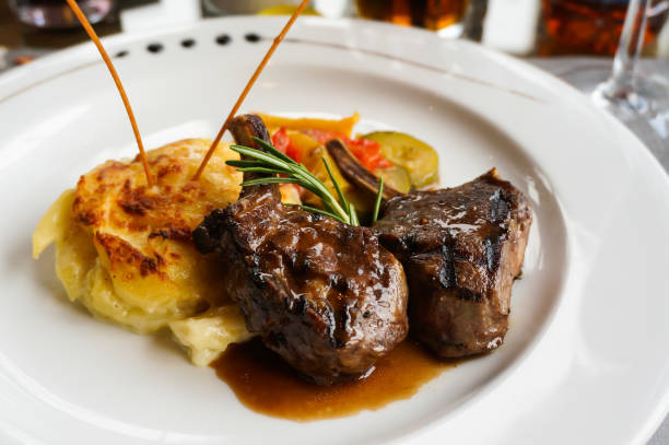 istock A delicious dish of lamb steak with smash potato. 682329134
