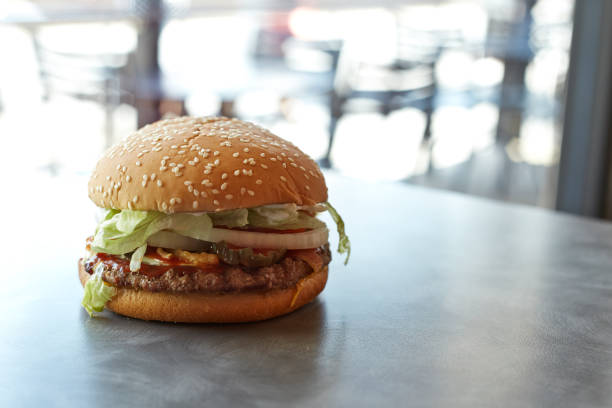 istock Homemade burgers on rustic wooden Background 682332822