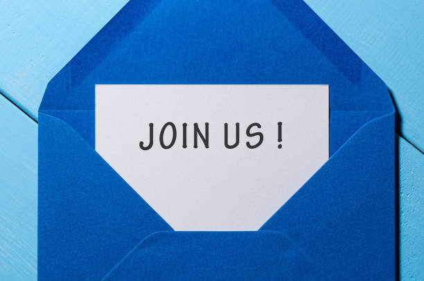 istock The words JOIN US written in vintage blue envelope 682333744