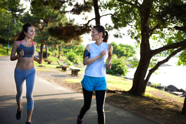 istock Women getting fit taking run afterwork in Tokyo 682337048