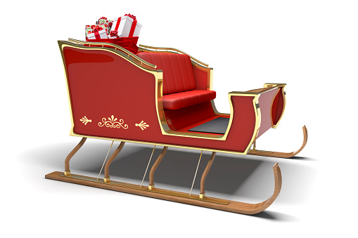 Santa Claus sleigh with sack full of Christmas gifts on a white background with clipping path.