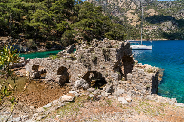 Celopatra bath from Gocek Bay. Fethiye / Turkey. Cleopatra bath, beach, sea, Göcek, Fethiye, Turkey -  middle east stonewall creek stock pictures, royalty-free photos & images