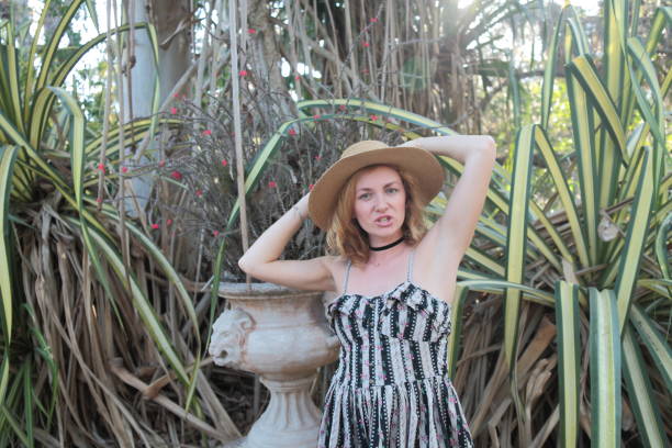 istock Woman in a tropical park. 682345818