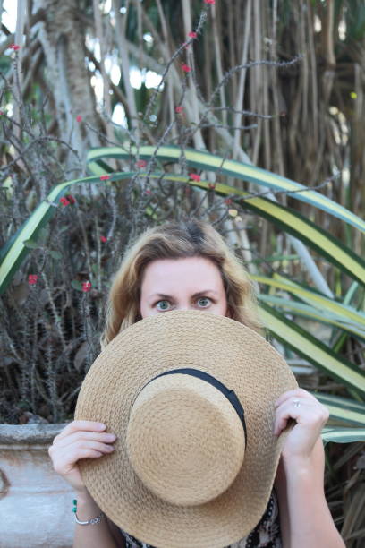 istock Woman in a tropical park. 682349632