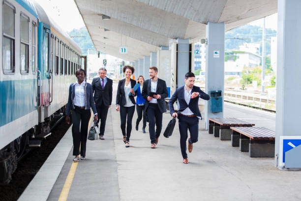 istock Business people on a railroad station waiting for train 682350076