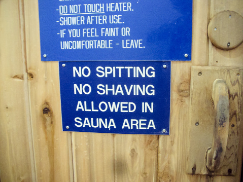 a sign on the door of a sauna
