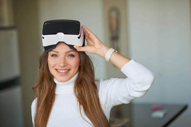 istock Young beautiful woman weating virtual reality glasses 682373802