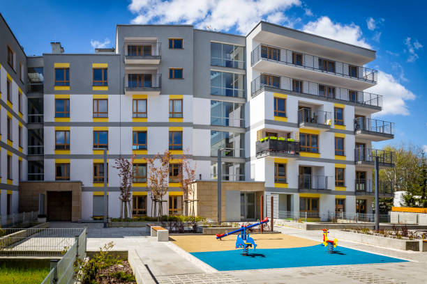 istock New modern apartment building with children's playground 682376850
