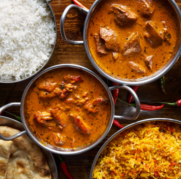 istock assortment of indian curry and rice dishes 682377066
