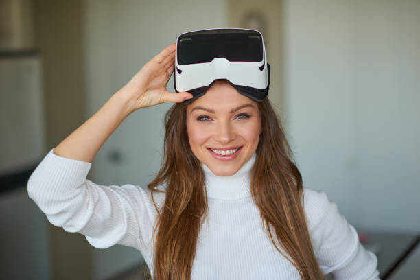istock Young beautiful woman weating virtual reality glasses 682380328