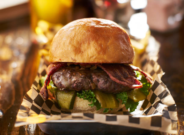 istock thick bacon cheese burger served in diner style tray 682380394