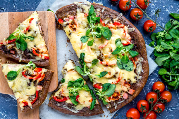 istock restaurant kitchen with pizza preparing on stone background top view 682382208