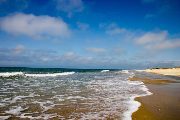 istock Seaside at day time with blue sky and clouds 682382280