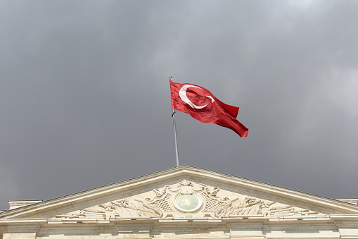 Turkish flag is flying over the Kuleli Military High School in Istanbul, Turkey