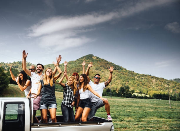 istock friends have fun on the van 682395320