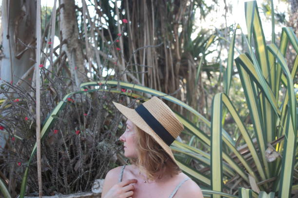 istock Woman in a tropical park. 682396646