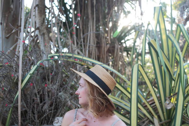 Woman in a tropical park.
