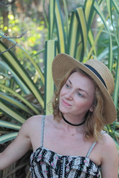 istock Woman in a tropical park. 682399376