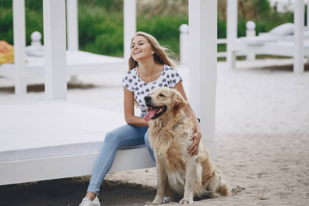 istock couple walking outdoors with her dog 682403378