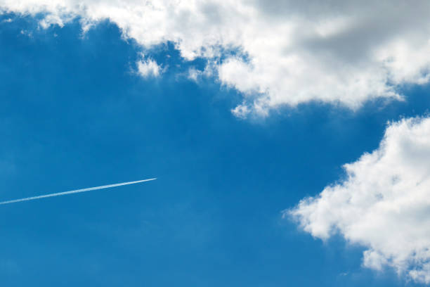 istock Jet plane high in the blue sky 682403494