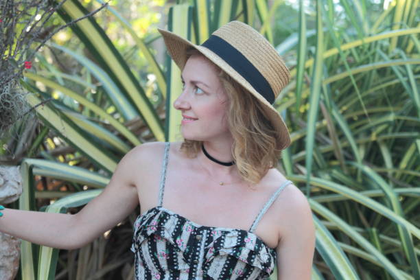 istock Woman in a tropical park. 682406018