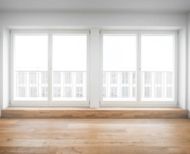istock empty room, wooden floor in new apartment 682409234