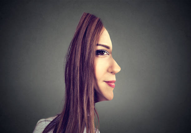 surrealistic portrait front with cut out profile of a woman surrealistic portrait front with cut out profile of a woman isolated on grey wall background side eye expression stock pictures, royalty-free photos & images