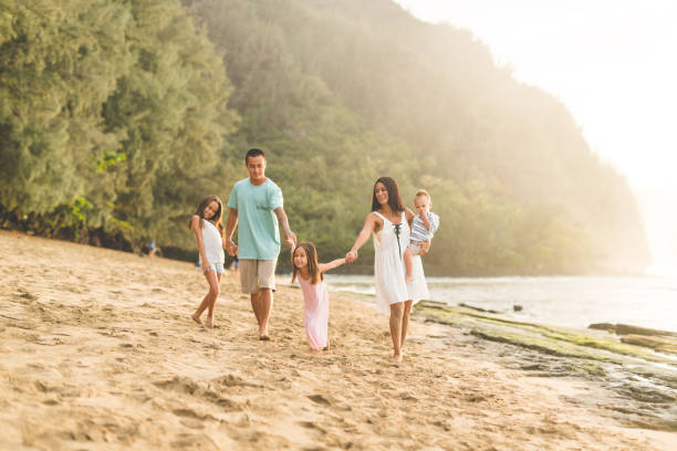 istock Hawaii family vacation on beach 682423646