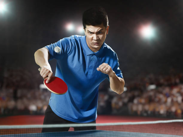 istock Young asian ping pong player playing table tennis game 682424676