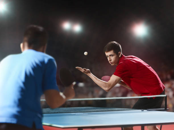 istock Two ping pong players play table tennis 682424718