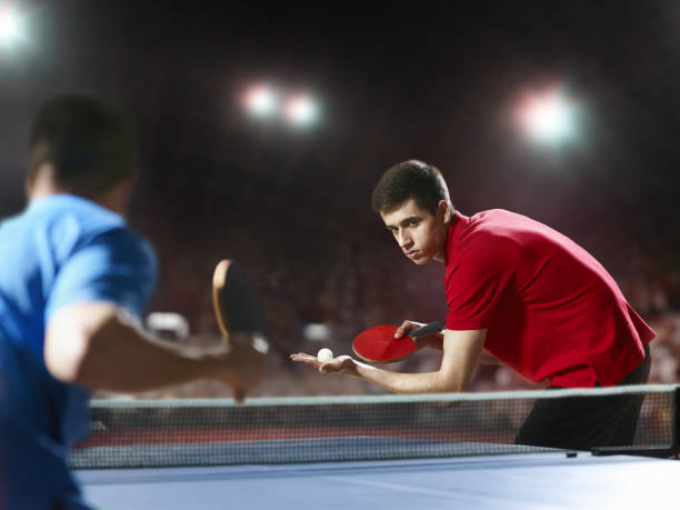 istock Two ping pong players play table tennis 682424730