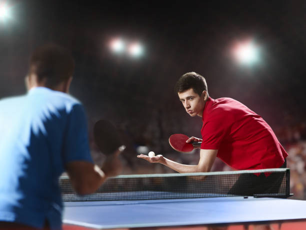 istock Two ping pong players play table tennis 682424732