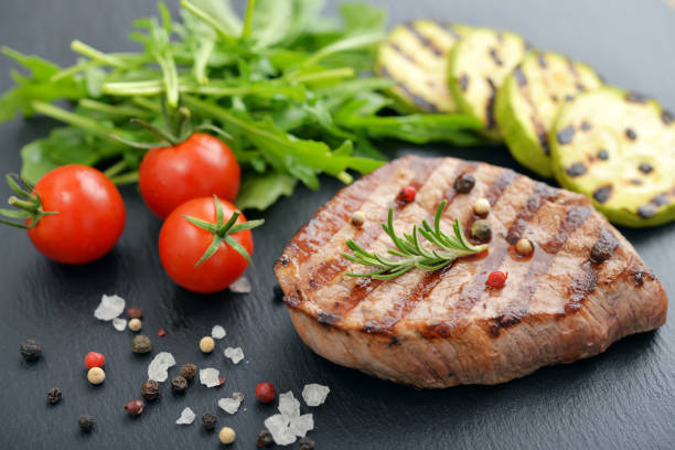 istock Grilled steak with rukkola 682435004